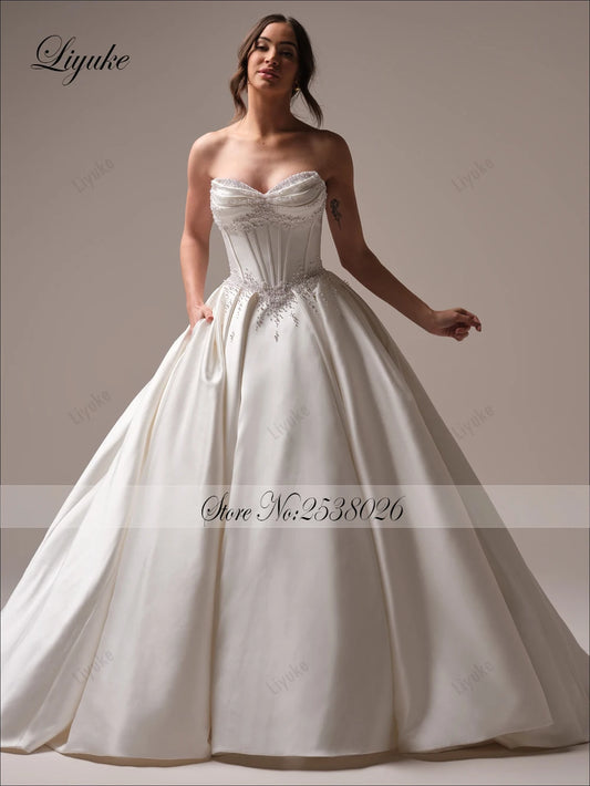 Liyuke Custom Made Beading Pearls Princess A-Line Wedding Dresses Sweetheart Bridal Gowns With Removable Bow