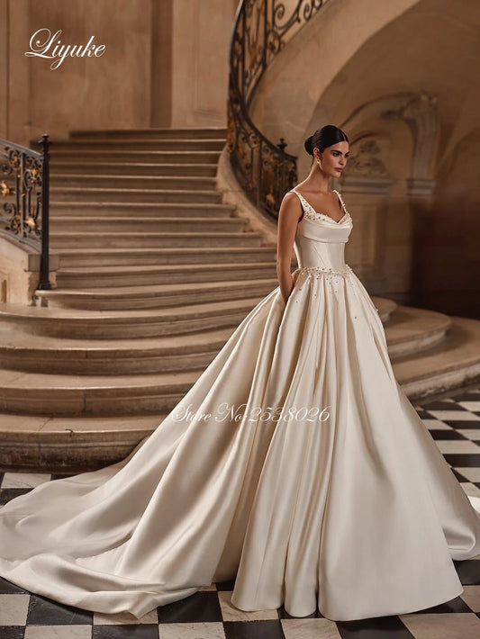 Liyuke Customize Made Luxury Satin Ball Gown Wedding dresses Spaghetti Straps Beading Pearls Elegant Bridal Gowns