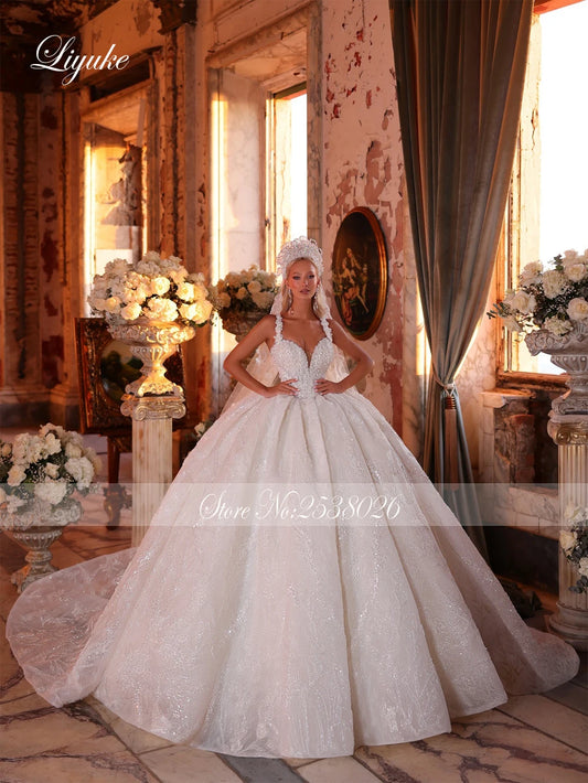 Liyuke Custom Made Luxury Lace Beading Pearls Embroidery Princess Ball Gown Wedding Dress Spaghetti Straps Puffy Bridal Gowns
