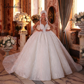 Liyuke Custom Made Luxury Lace Beading Pearls Embroidery Princess Ball Gown Wedding Dress Spaghetti Straps Puffy Bridal Gowns